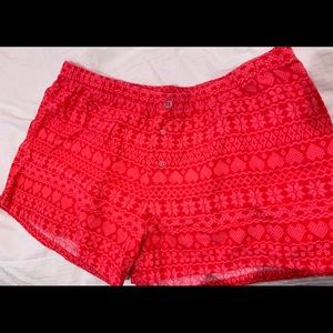 Cute red pajama shorts with sparkly buttons